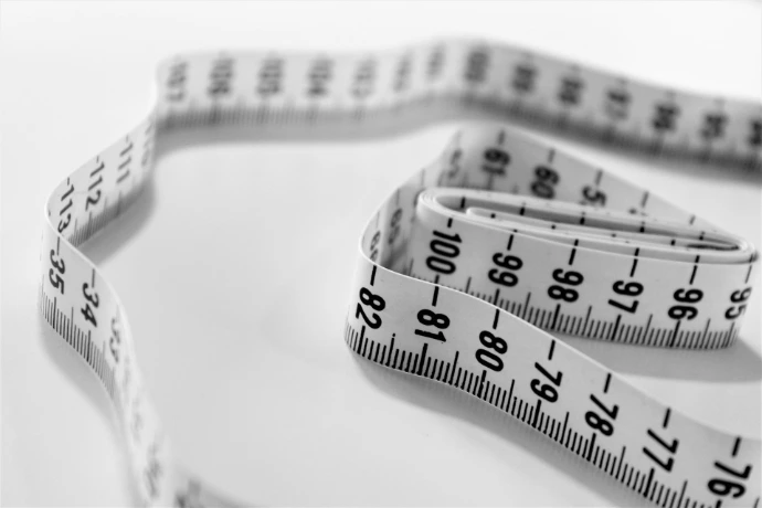 Tape measure and tailoring tools – customized accounting systems tailored to business needs.