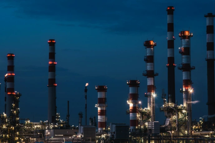 red and white tower under blue sky during night time
