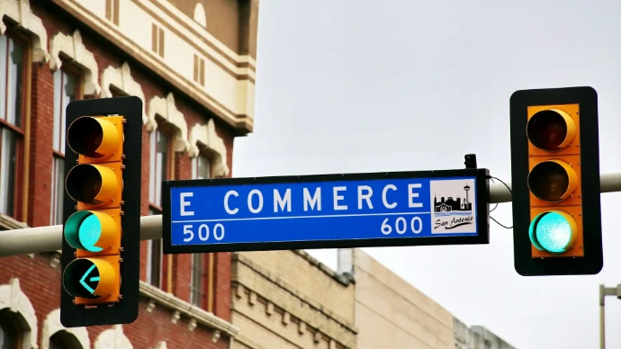 Blue street sign showing sales tax directions – state sales tax nexus and multi-state compliance for eCommerce sellers.